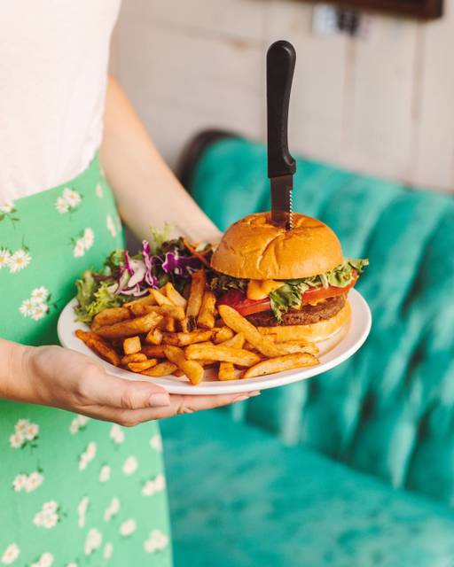 Cover of 3 cafes serving delicious vegan burgers in Montreal