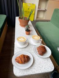 Just us, lattes, croissants, and plants at Eclair on a Saturday morning. 
