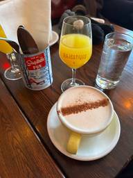 +: London fog and mimosa were great! Ambience is unique being a bar/cafe
-: sound levels are on the louder side