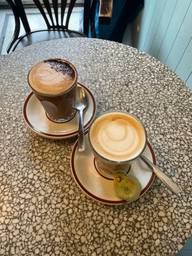 Latte and pistachio amaretti at Café Ferlucci on a rainy afternoon 😌