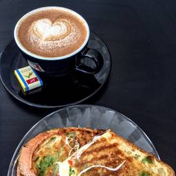 Had to grab a bite of this grilled-cheese before taking the photo ☕️🥪